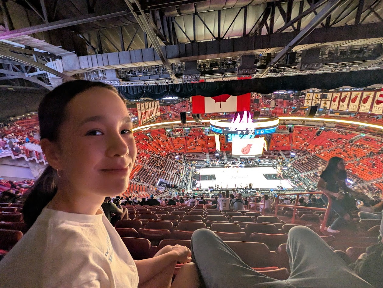 Rae at a basketball arena